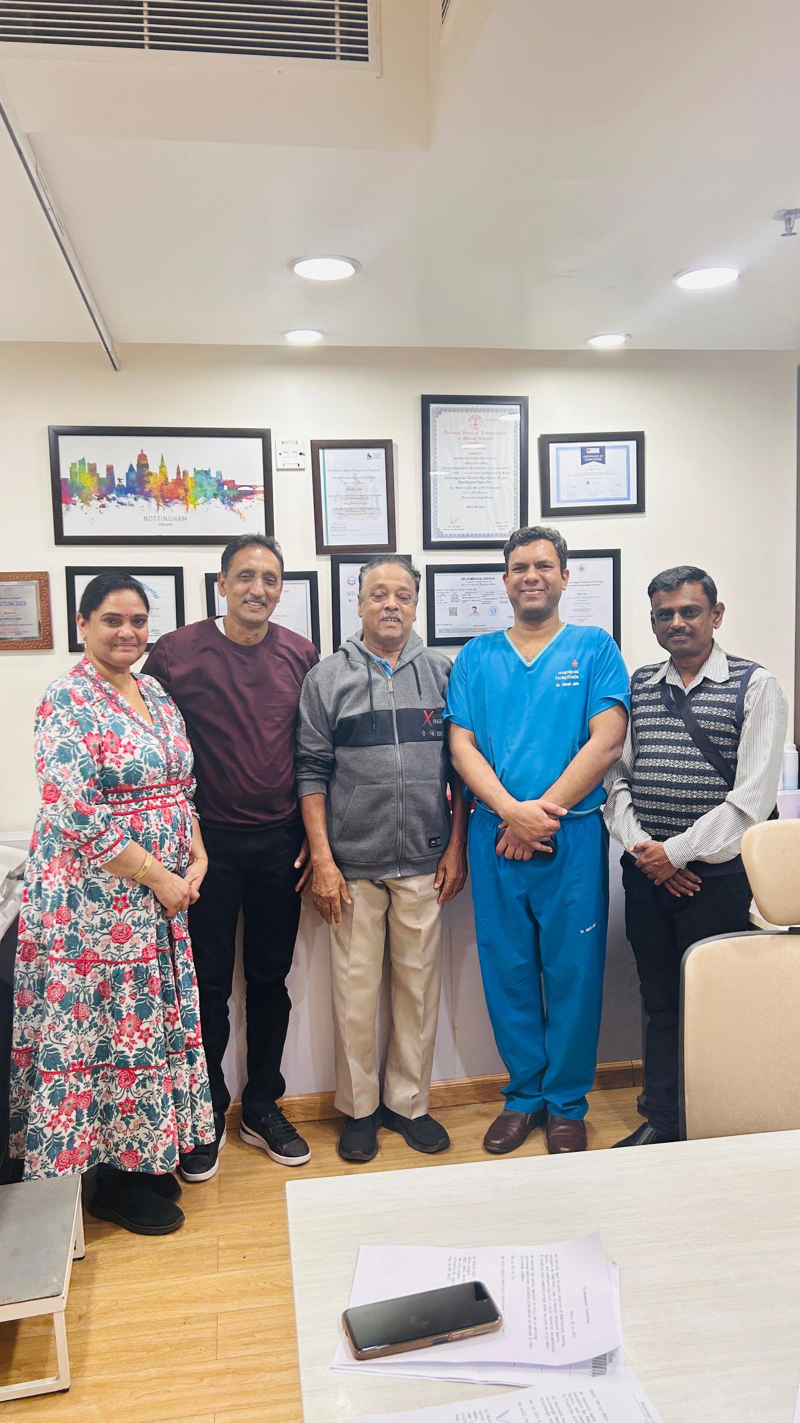 Fiji Patient and Attendant with Spine Surgeon After Successful Spine & Heart Surgery In Delhi